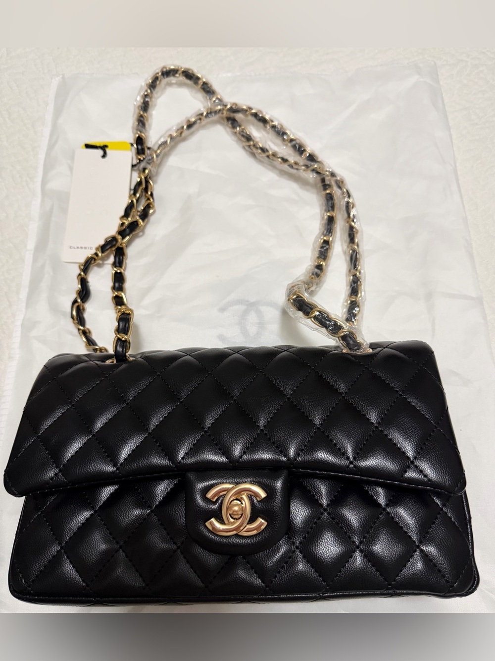 Black Quilted Shoulder Bag with Gold Chain